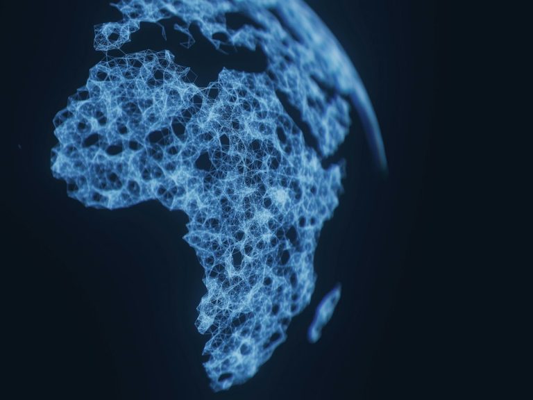 Why we're different Outline of Africa made with interconnected blue dots on a dark background.